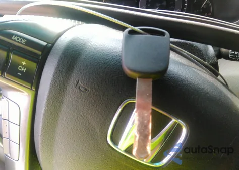 2014 Honda Odyssey Lx z USA, uszkodzony, nr VIN 5FNRL5H2XEB106627